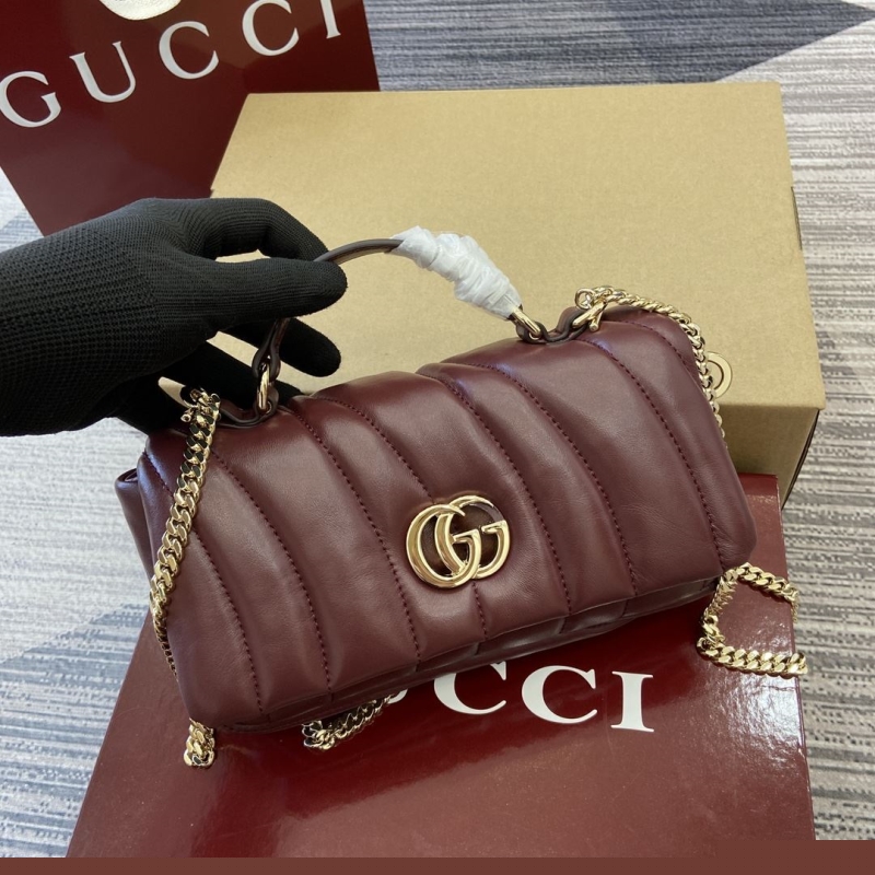 G*u*i top handle bags